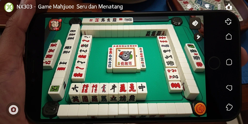 Tangkapan layar gameplay NX303 yang menunjukkan keseruan bermain Mahjong.